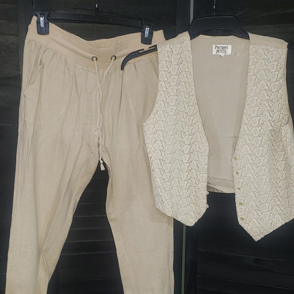 Cream Track Pants with Elastic Waist and Relaxed Fit.